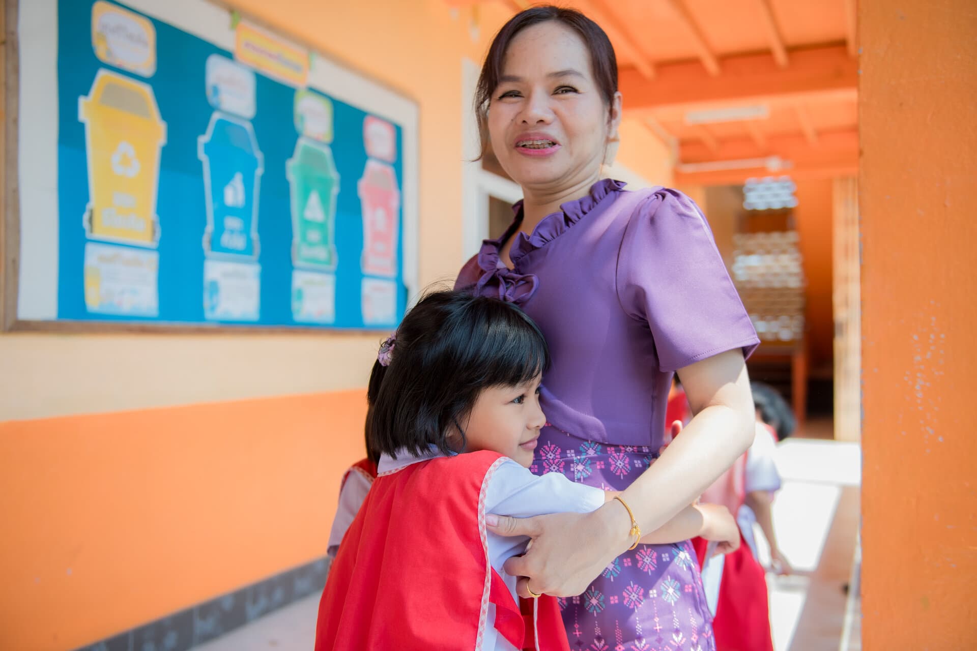 Child showing appreciation to teacher